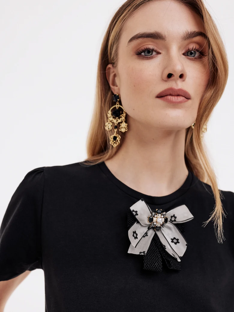 Black blouse with bow and short sleeves