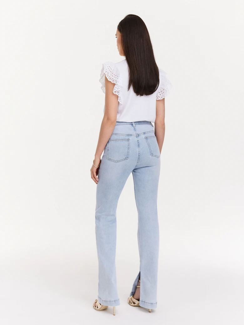 White blouse with openwork inserts