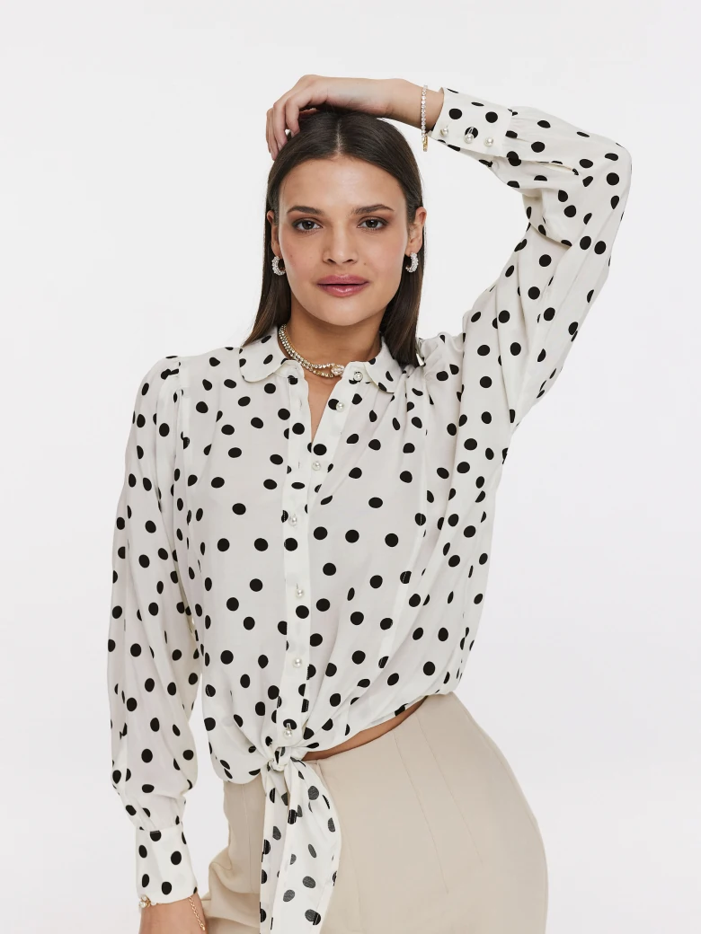 White shirt with black peas