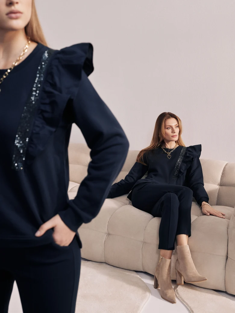 Navy blue blouse with ruffles