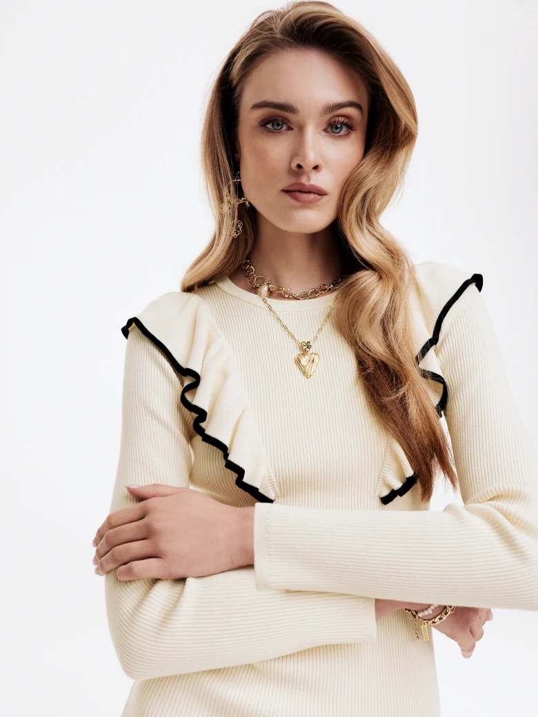 White fitted dress with ruffles