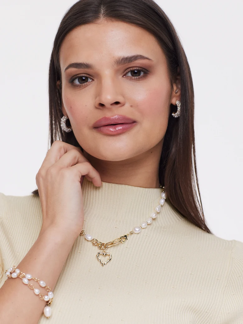 Fitted half turtleneck in ribbed knit fabric