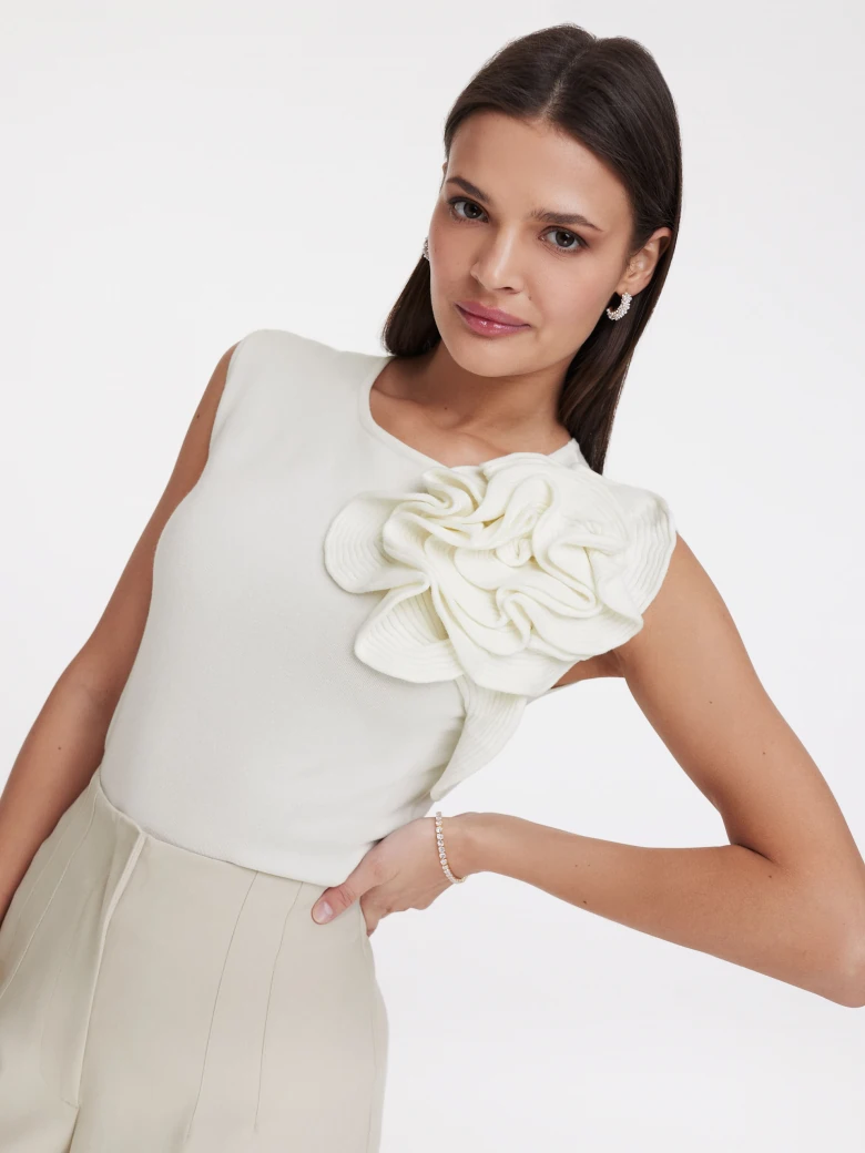 Cream blouse with three-dimensional flower