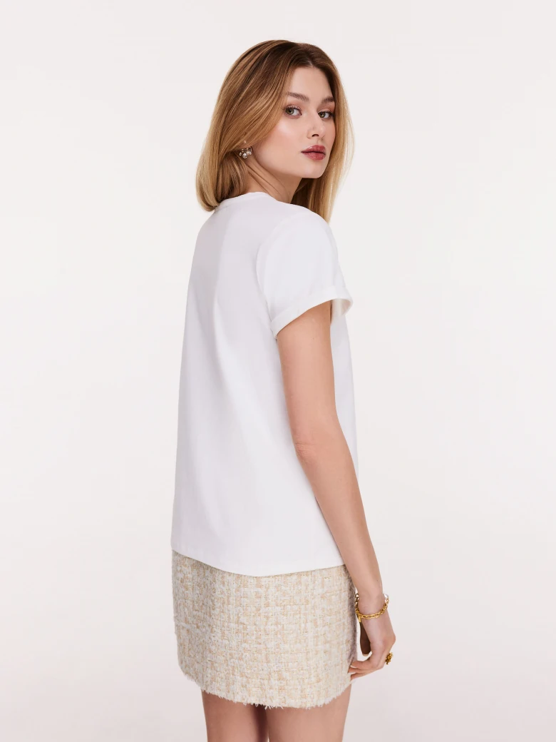 Cotton blouse with flower embellishments