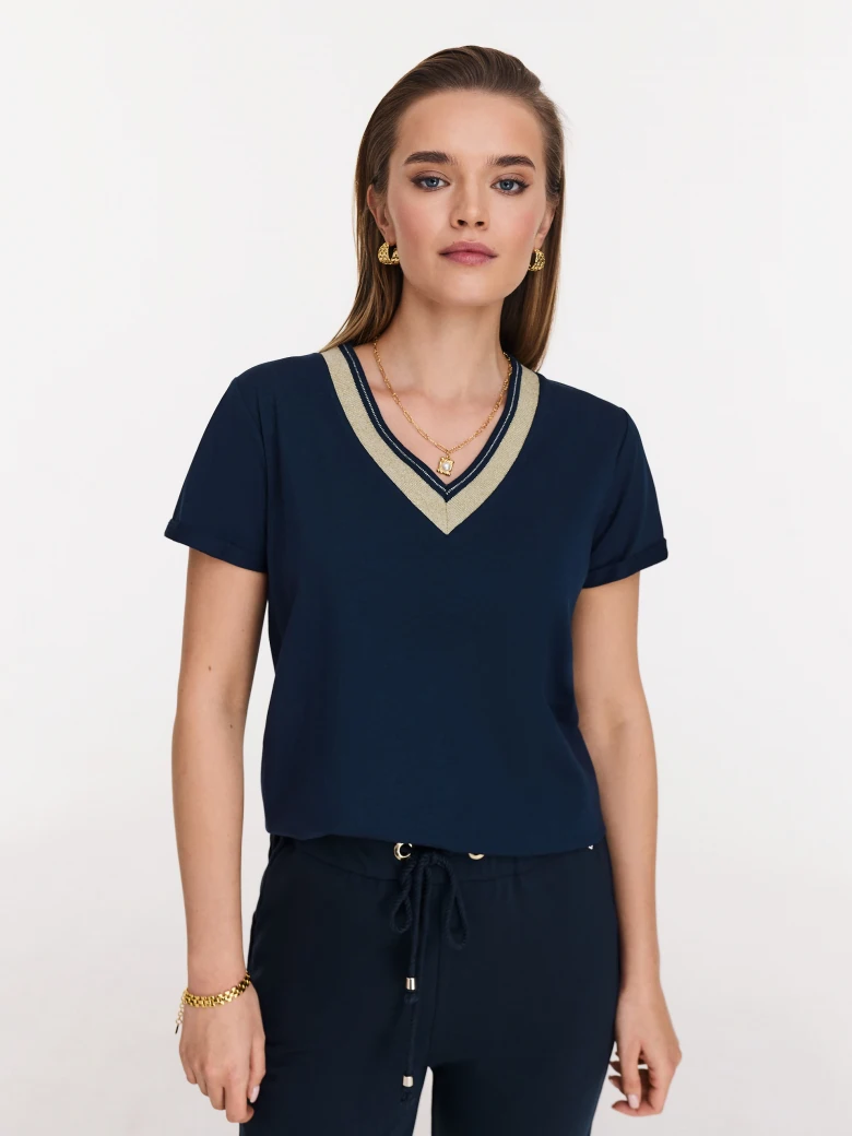 Navy blue blouse with piping and short sleeves