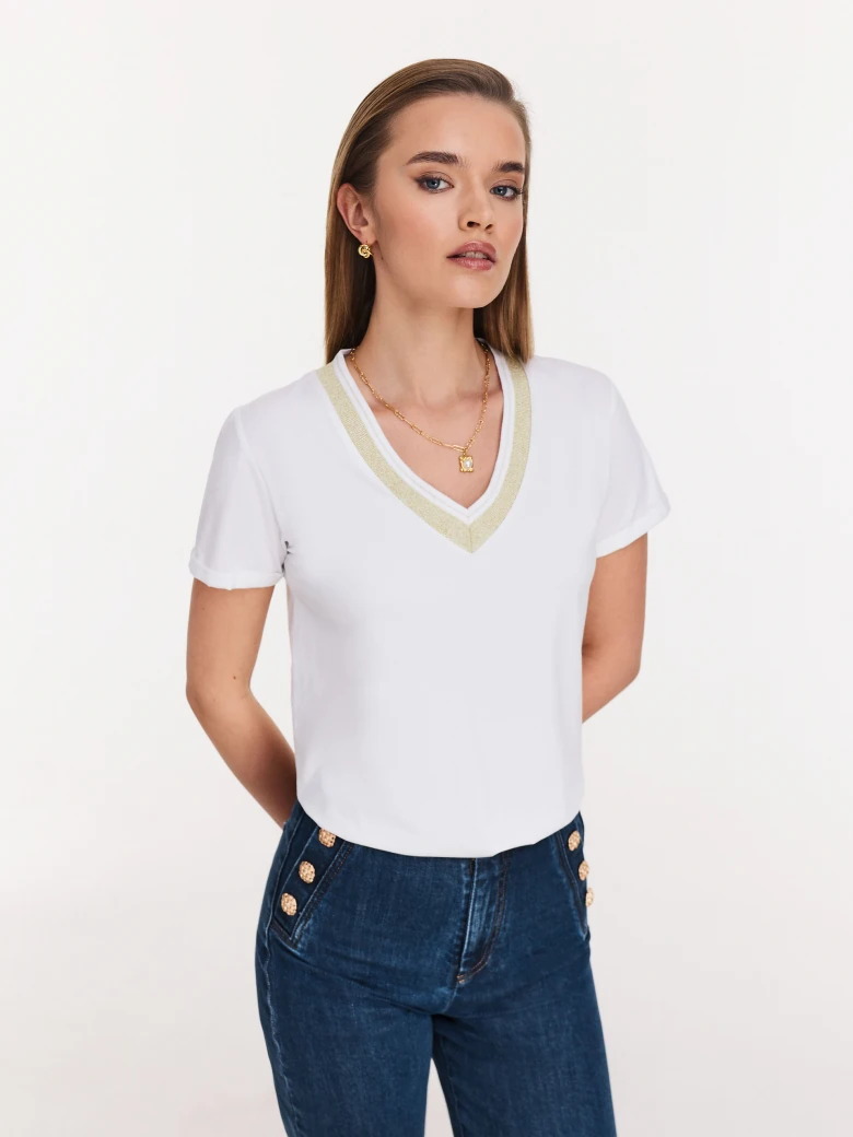 White blouse with piping and short sleeves