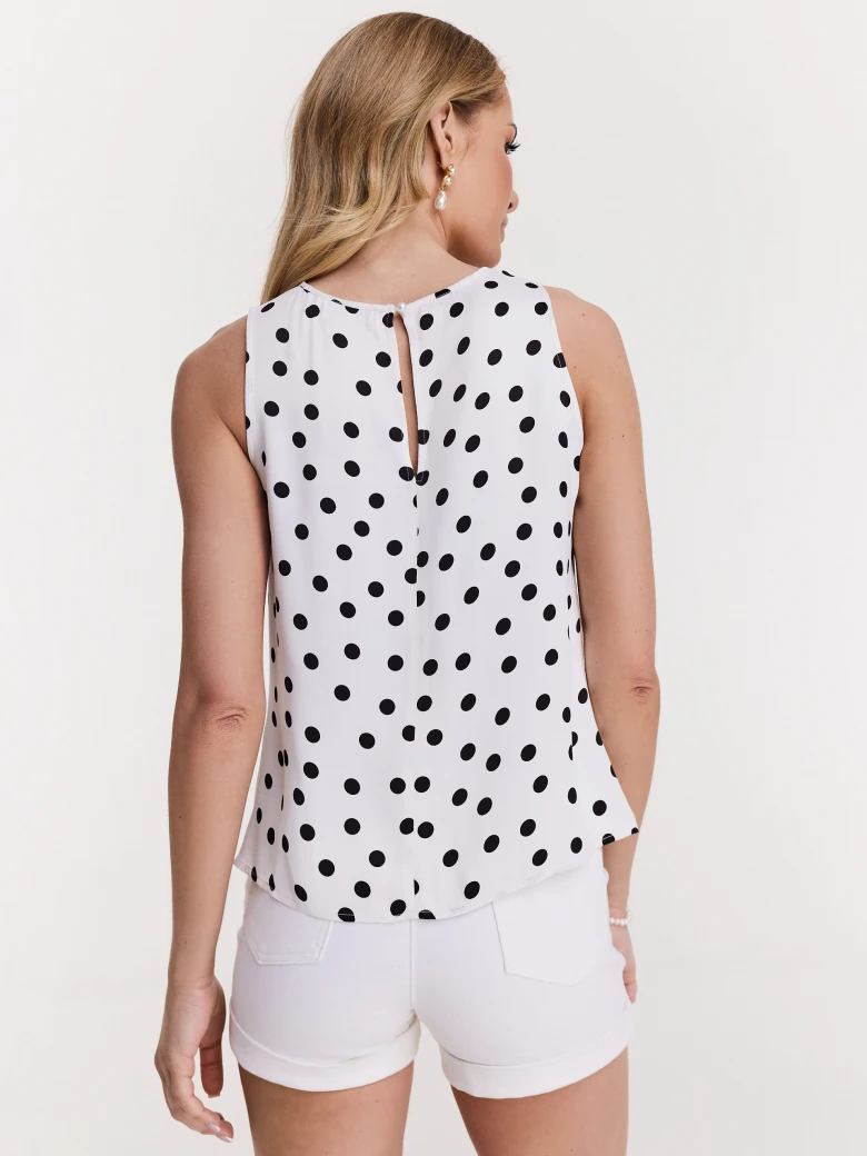 White blouse with black peas