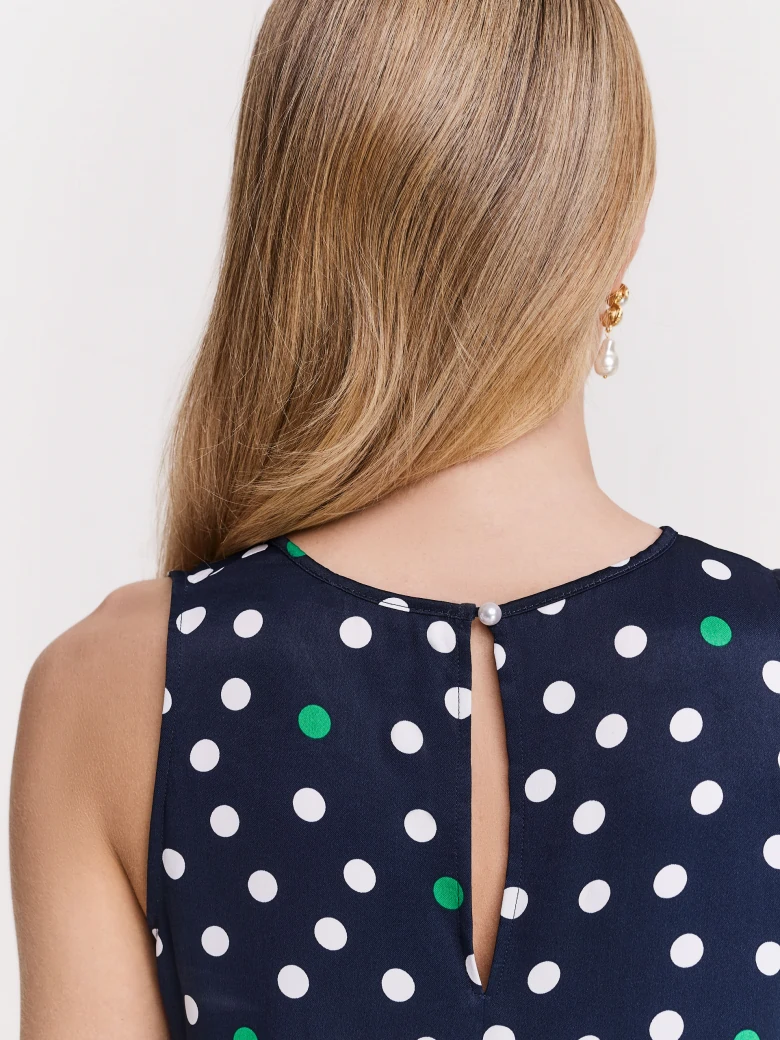 Navy blue blouse with colorful peas