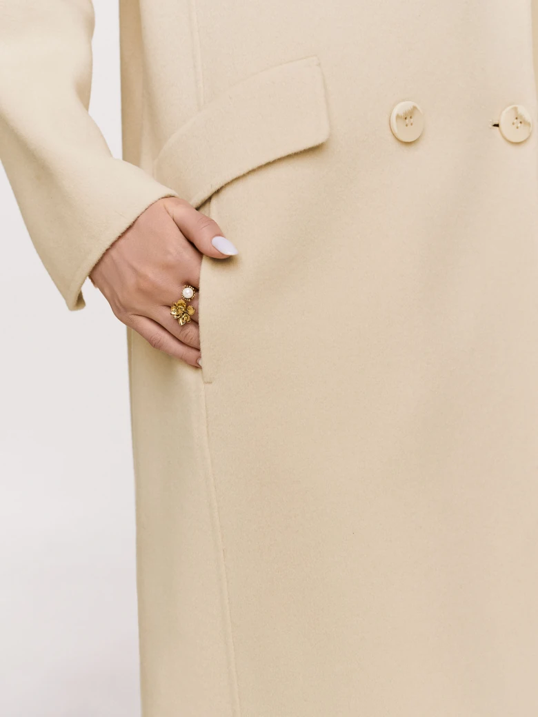 Wool cream coat with a classic cut