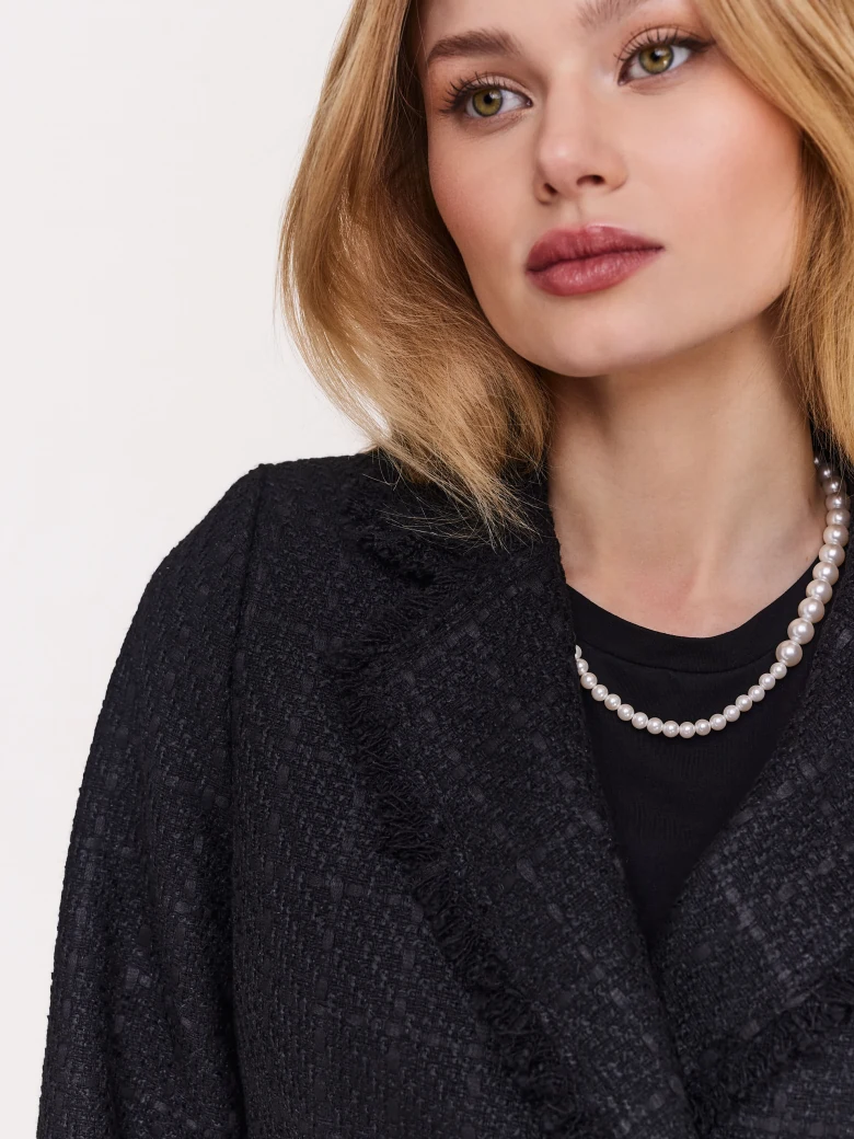 Black bouclé fabric coat