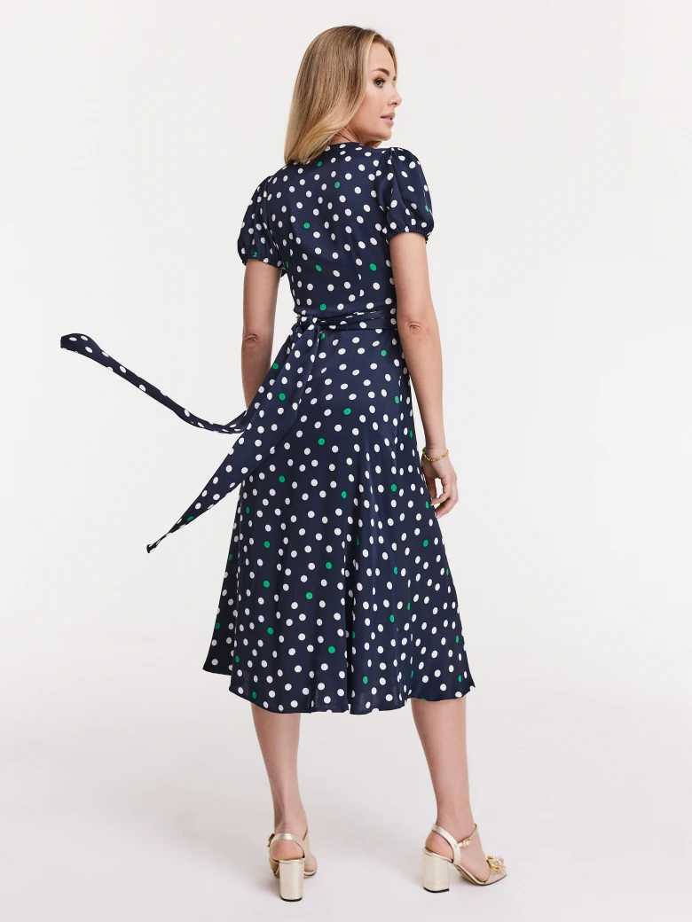 Navy blue dress with white and green peas