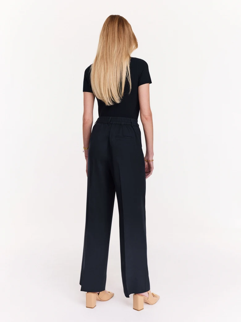 Navy blue pants with wide legs