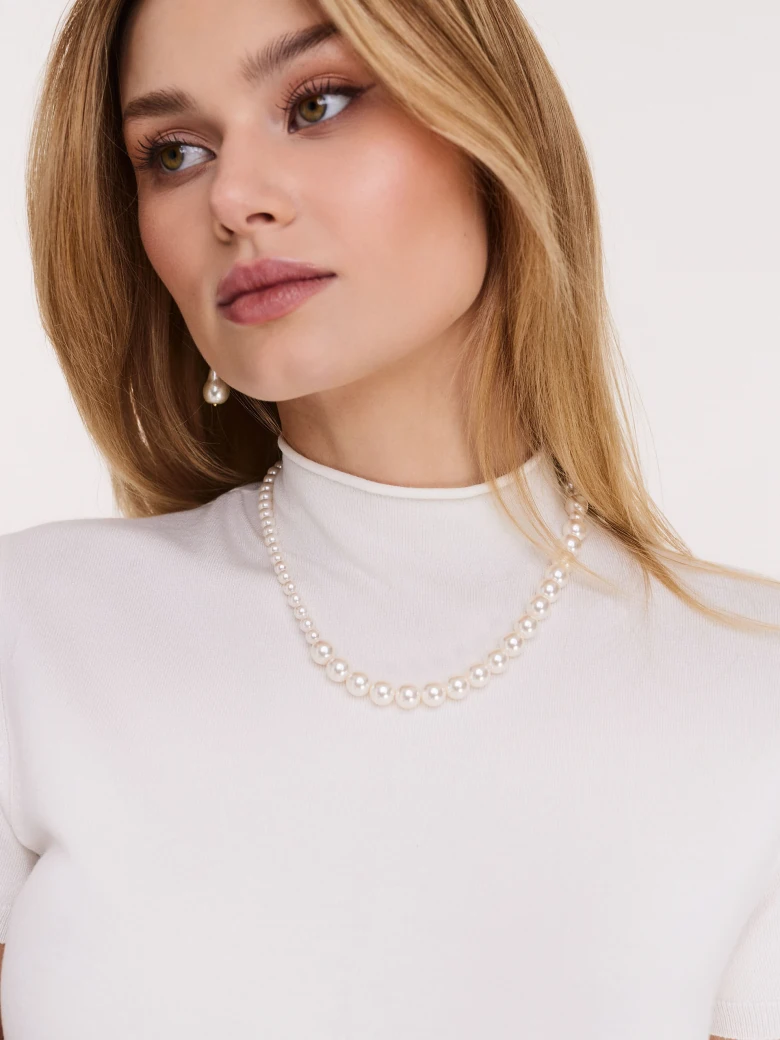 White viscose sweater with short sleeves