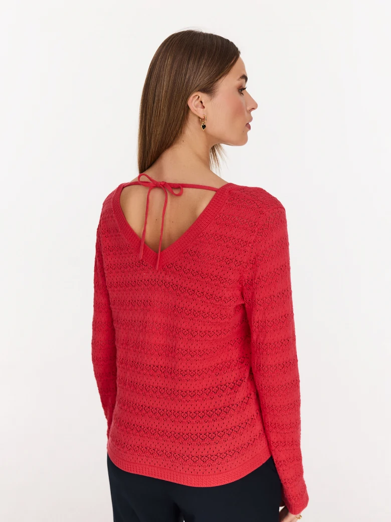 Red openwork sweater with V neckline