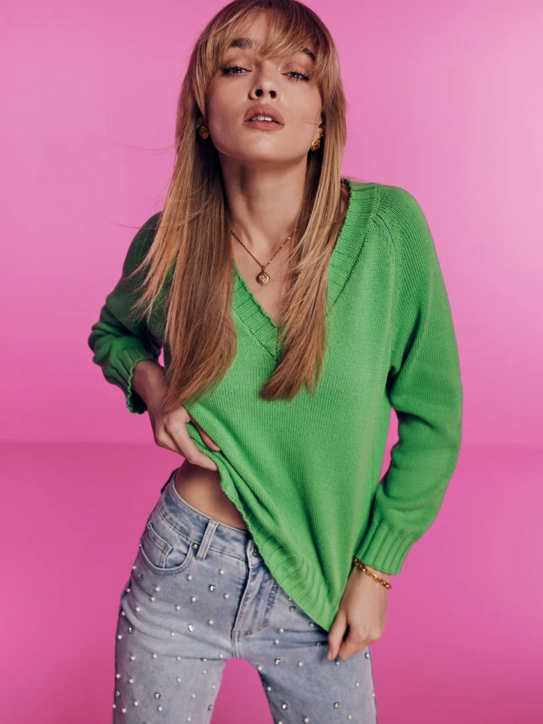 Green sweater with a heart neckline