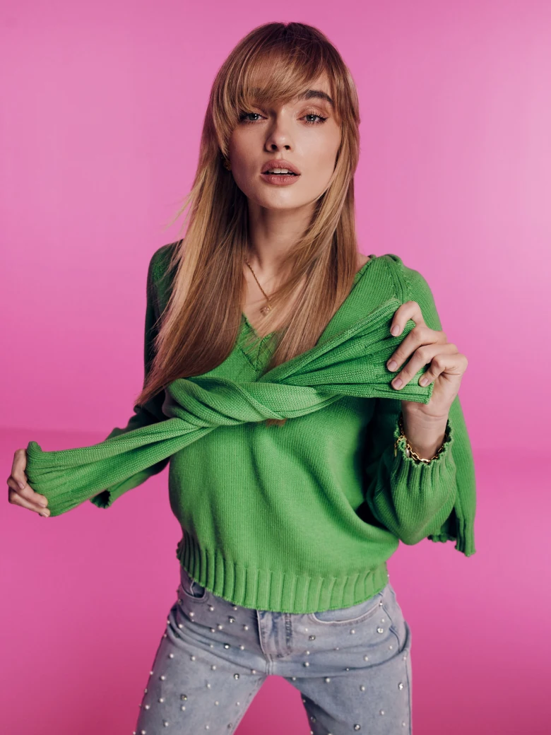 Green sweater with a heart neckline