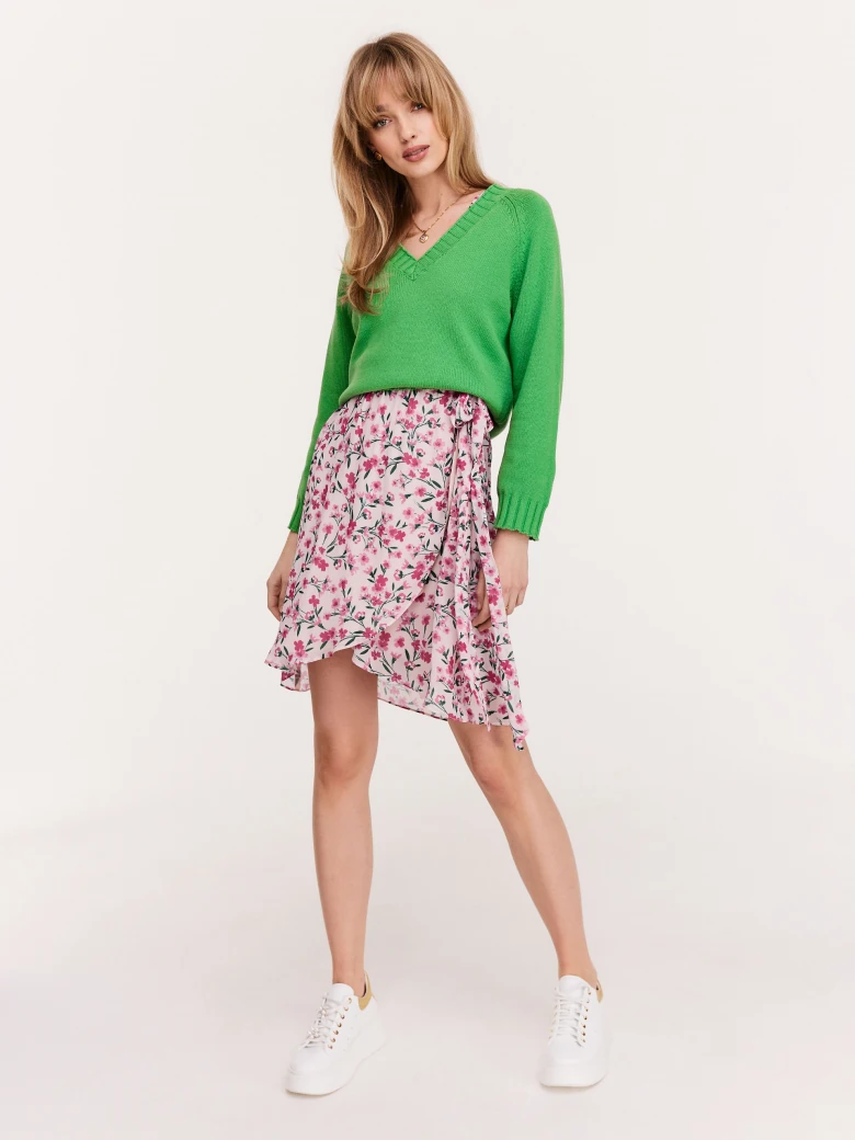 Green sweater with a heart neckline
