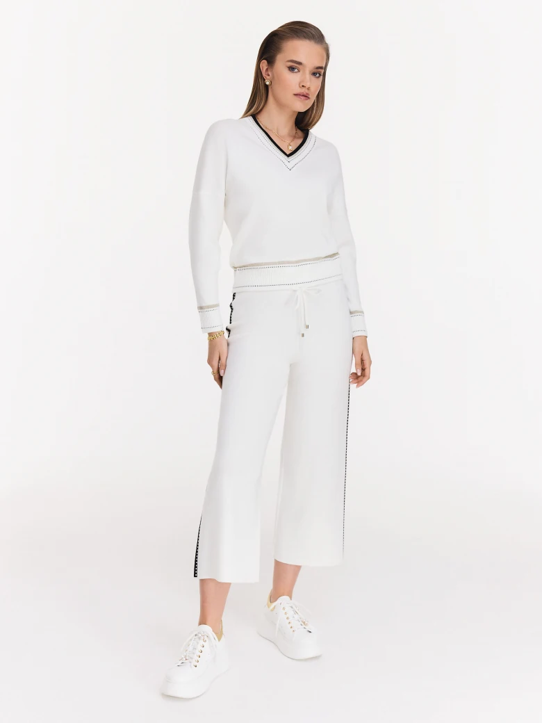 Cream sweater with V neckline