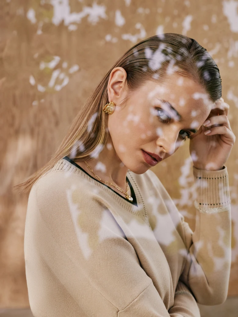 Beige sweater with V neckline