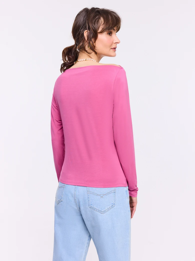 Pink blouse with ruffles and long sleeves