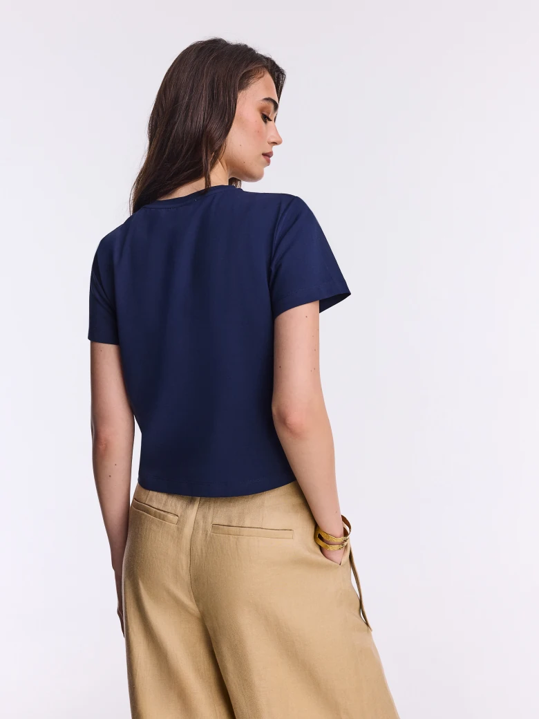 Navy blue cotton blouse with beaded brooches