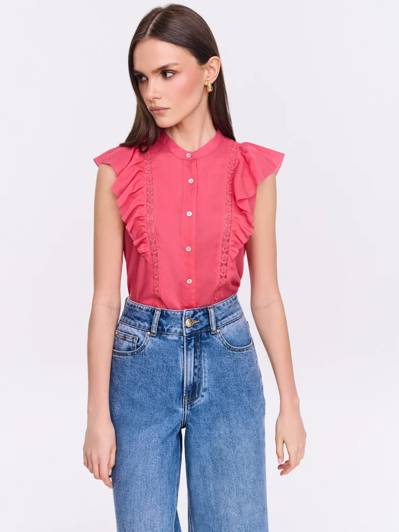 Coral button-down blouse with openwork embellishments and a stand-up collar