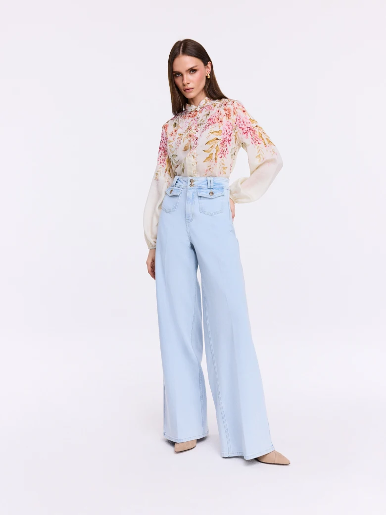 Creamy shirt with a stand-up collar and floral patterns