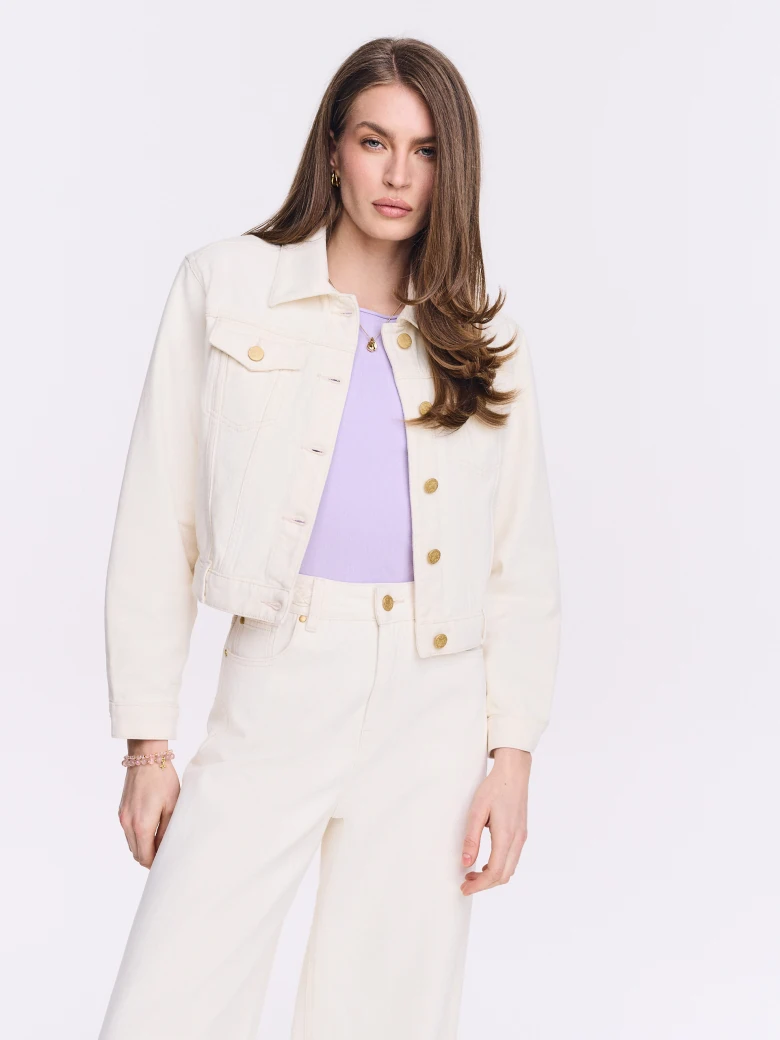 Cream denim jacket with gold buttons