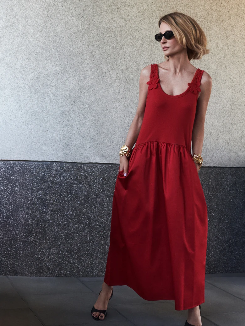Red midi dress with decorative straps