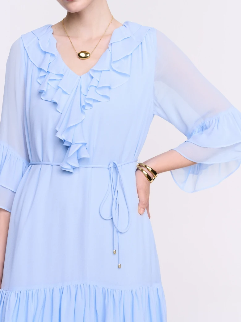 A short blue dress with ruffles