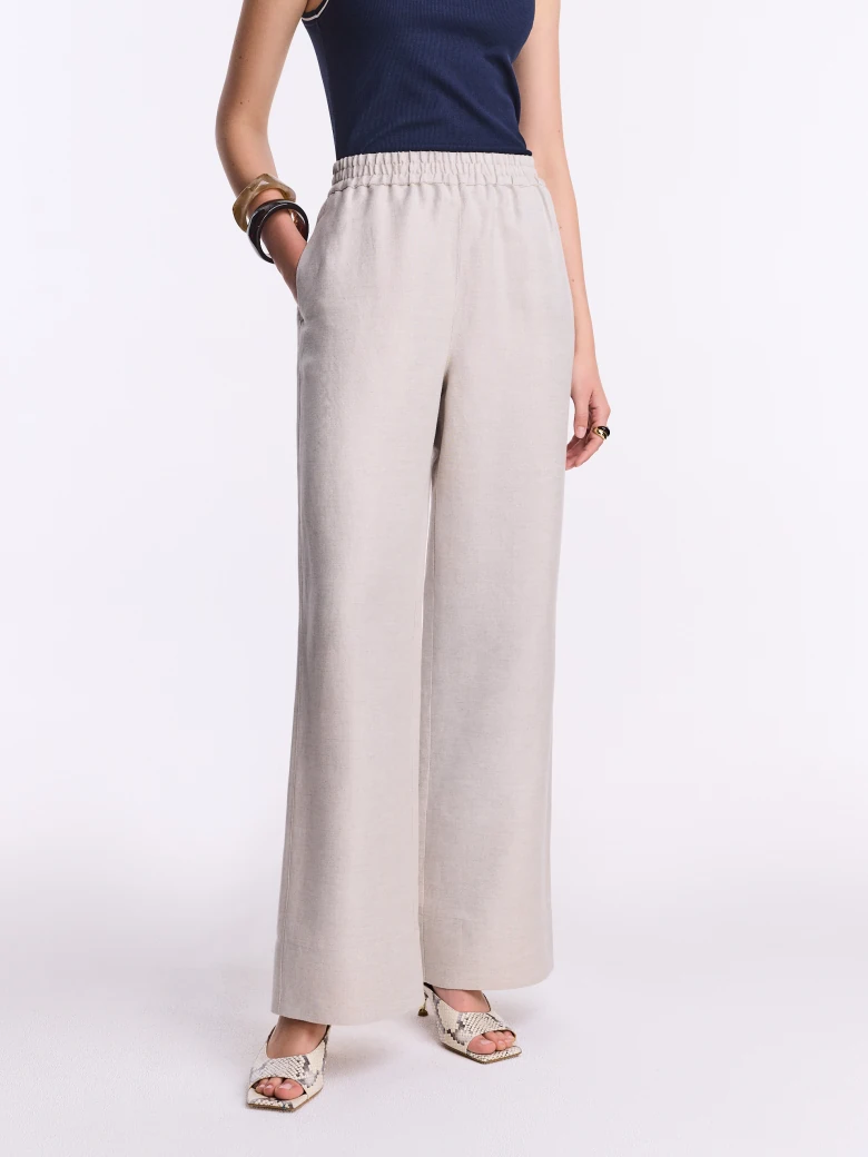 Loose beige linen and viscose trousers