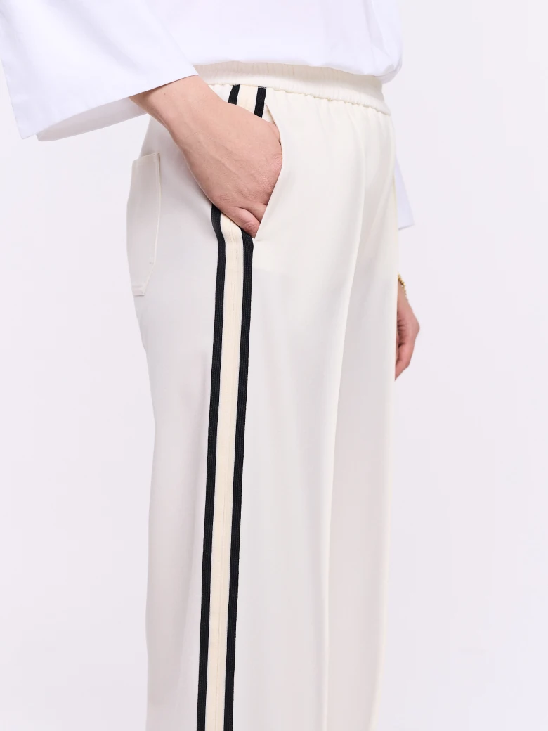 Cream pants with black piping