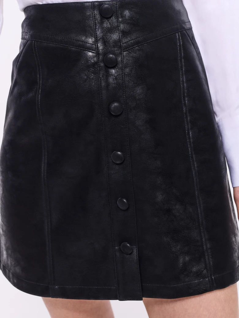 Short black faux leather skirt