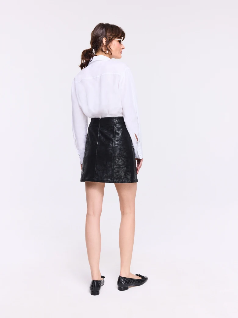 Short black faux leather skirt