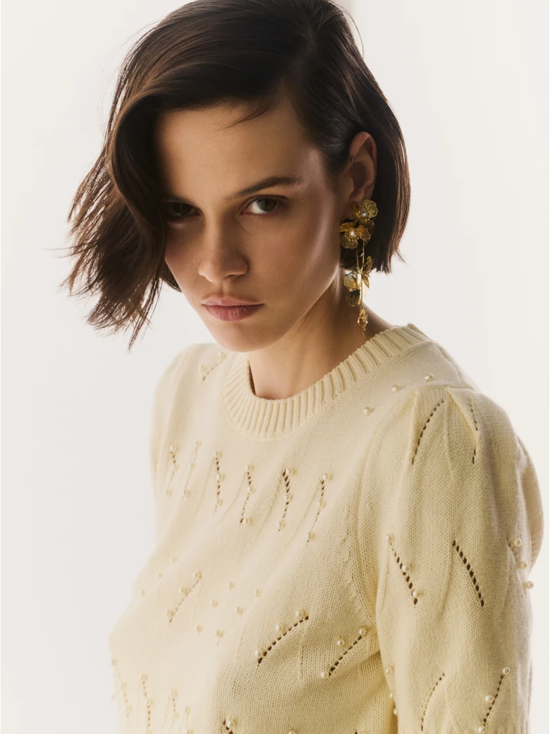 Openwork cream sweater with short sleeves