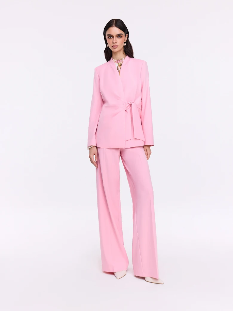Unique pink jacket with a tie at the waist