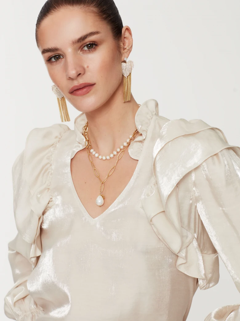Cream shirt with ruffles