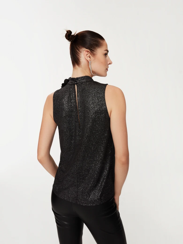 Black blouse in shiny material