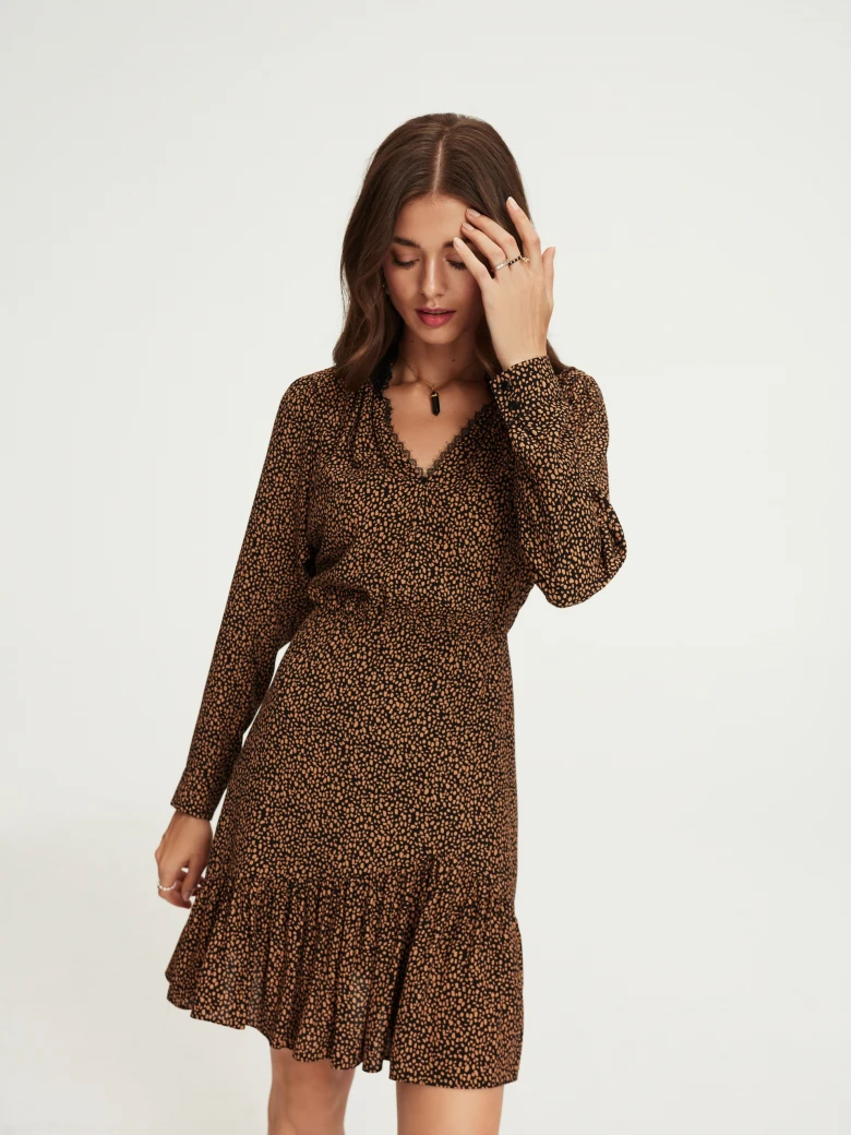 Short dress with ruffle