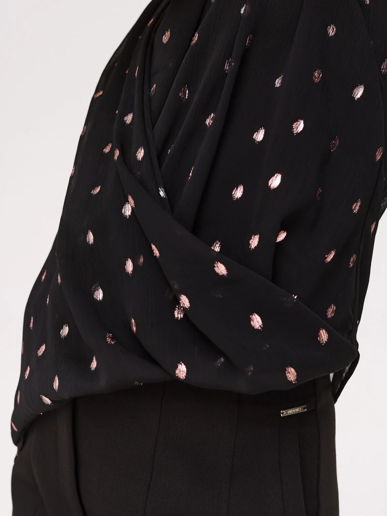 Black sleeveless blouse with fine pattern