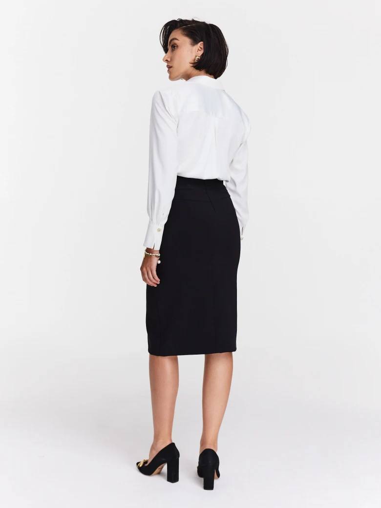 Elegant white shirt with decorative buttons