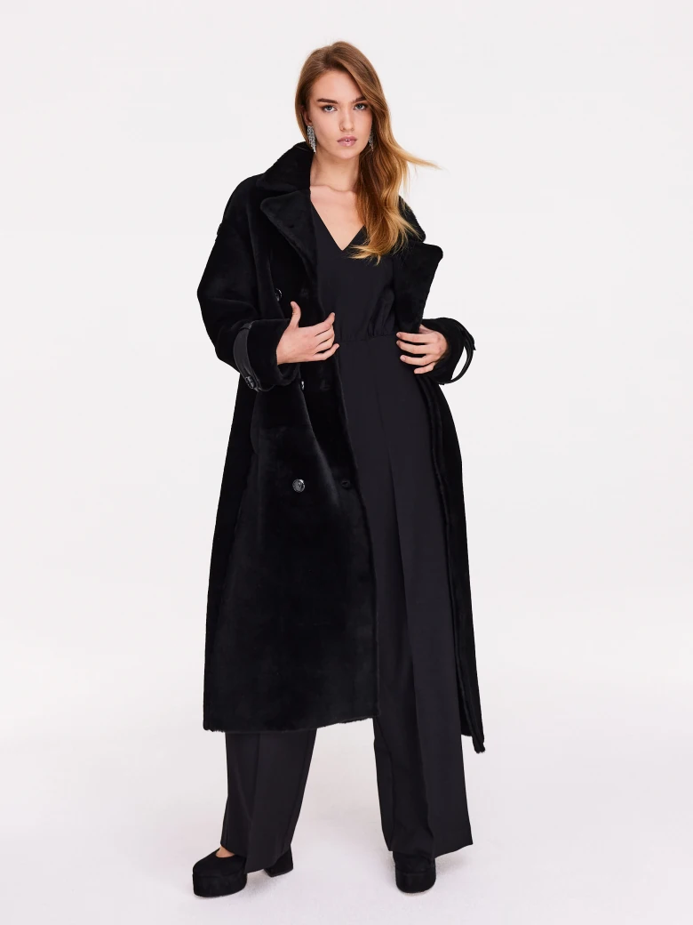 Black genuine leather sheepskin coat with double-breasted closure