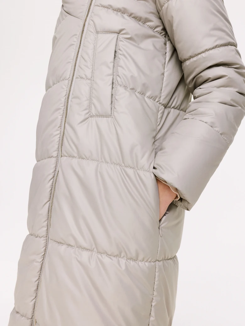 Long quilted coat in beige color