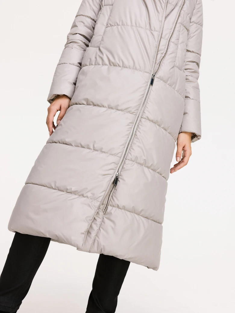 Long quilted coat in beige color