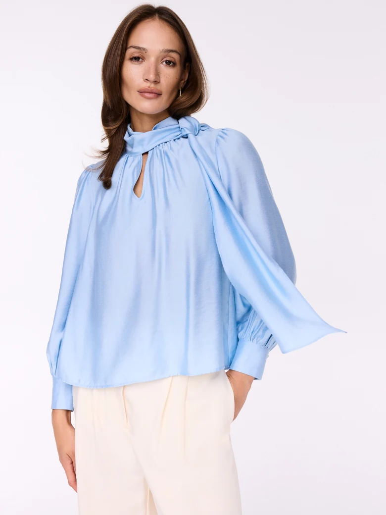 Elegant blue shirt with ties