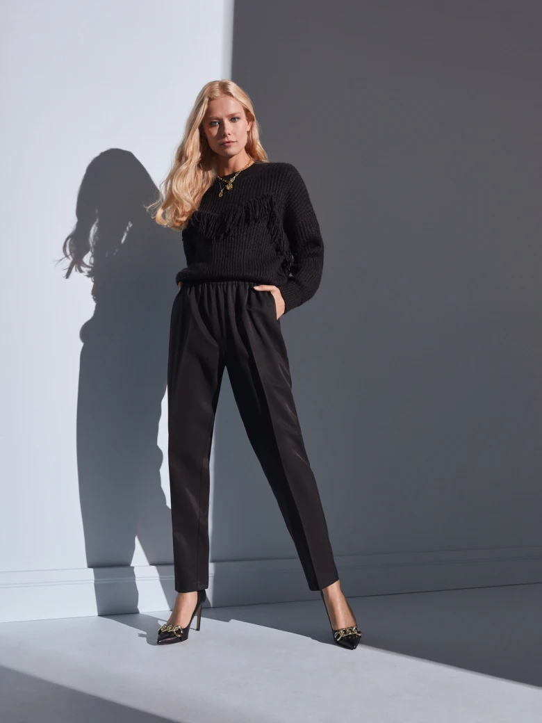 BLACK SWEATER WITH TASSELS