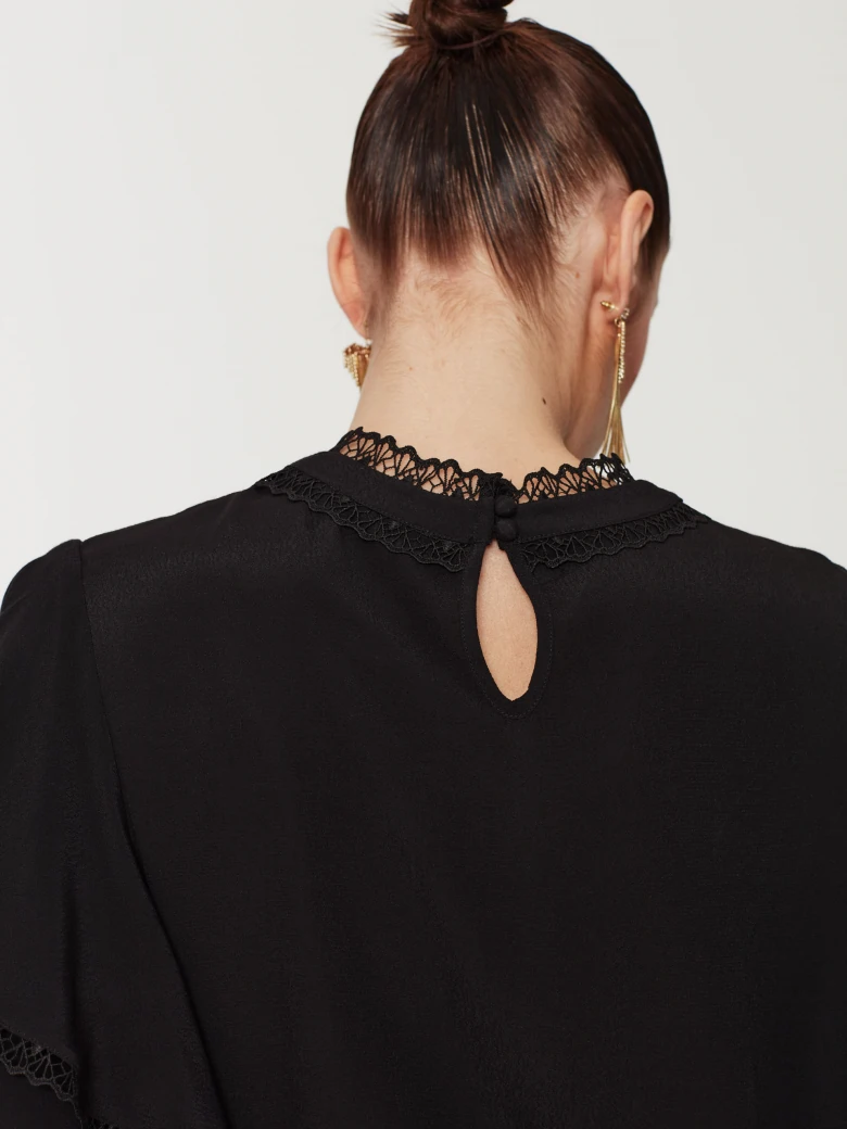 Black blouse with lace inserts