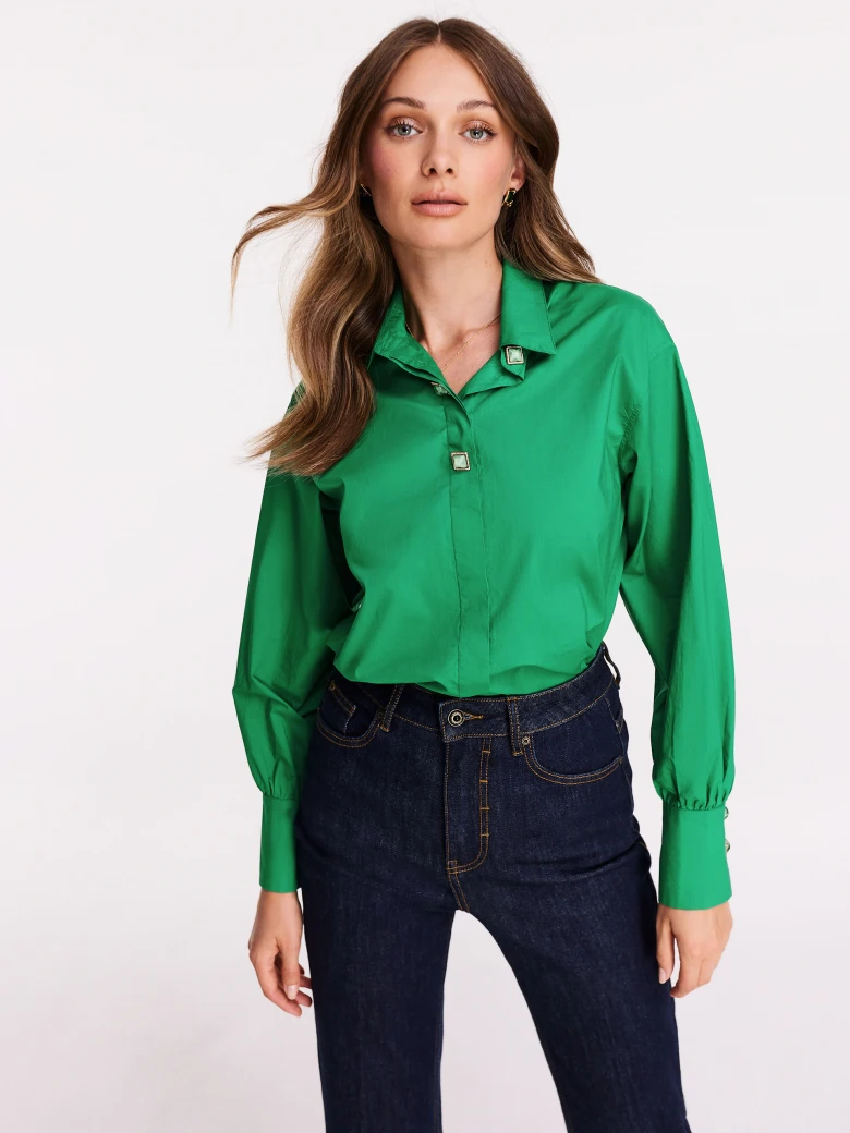 Satin green shirt with decorative buttons