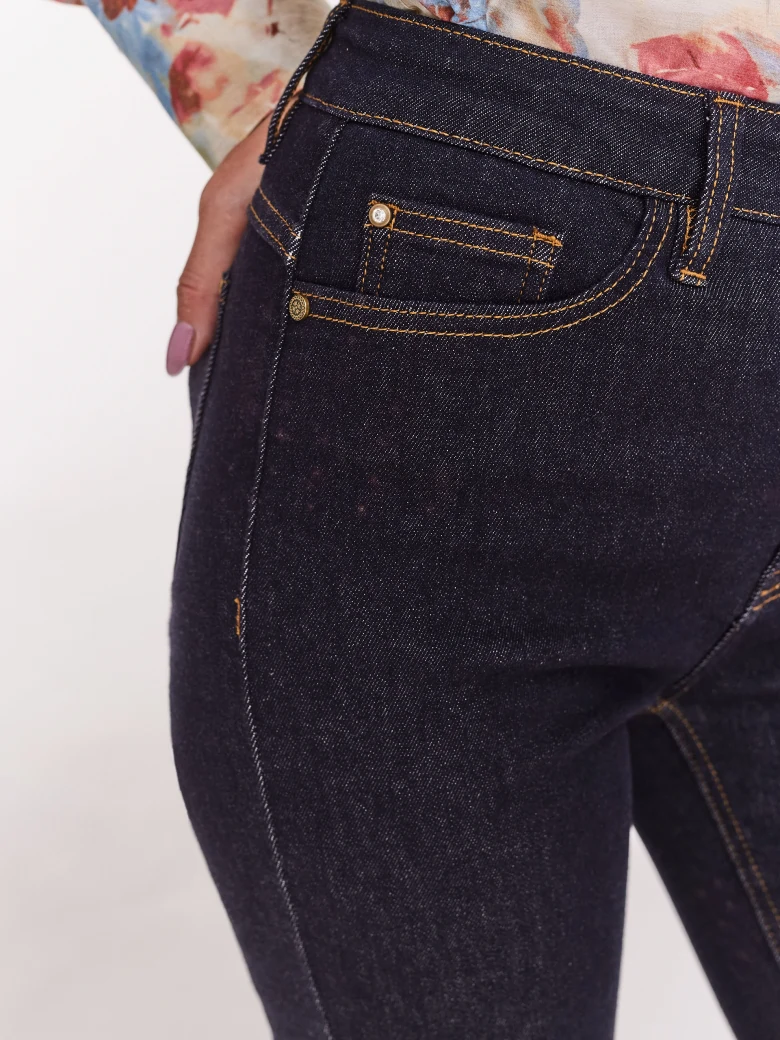 Fitted navy blue high-waisted denim pants