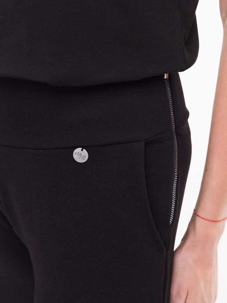 Black leggings pants with silver zipper closure